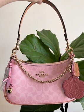 (negotiable) NWT Coach Teri Shoulder Powder
Pink Bag